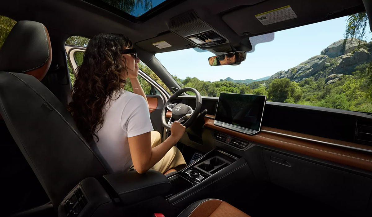 Volkswagen SUV interior with panoramic roof view